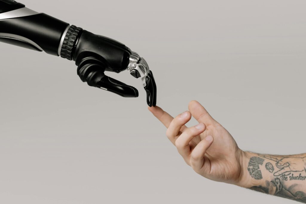 two-hand-connecting-with-each-other-showing-AI-with-humans